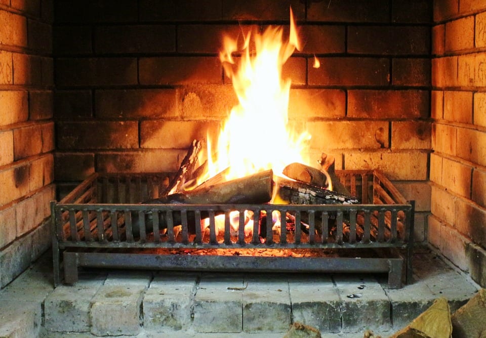 Checking the fireplace flue can help you save energy during cold months.