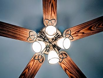 Reverse your ceiling fan to lower your electricity bill.