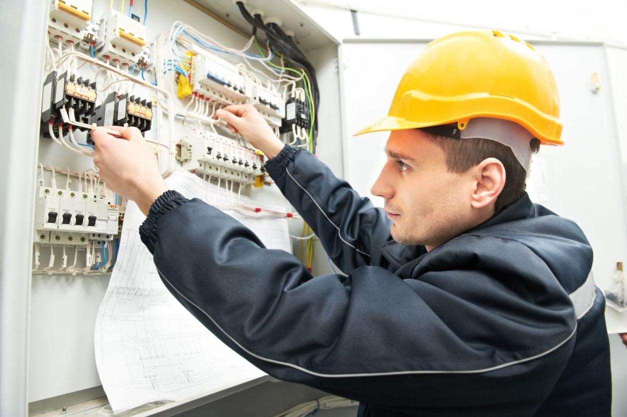 Electrician Working on Upgrading electrical panel